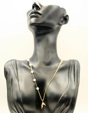 Waterproof gold whale tail pendant on pearl chain Dubai.