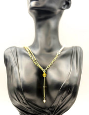 Biya Accessoires 18K gold plated layered lariat necklace with vintage coin and baroque pearl drop.