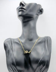 Biya Accessoires 18K gold plated Love necklace with dancing crystal heart.