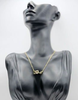 Biya Accessoires 18K gold plated Love necklace with dancing crystal heart.