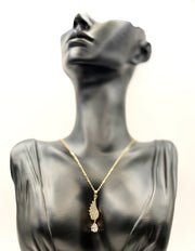 Close-up of premium hypoallergenic imitation jewelry featuring a crystal wing pendant.
