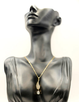 Close-up of premium hypoallergenic imitation jewelry featuring a crystal wing pendant.