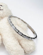 Modern luxury fine art editorial jewelry snake scale pave bracelet gift for her.