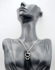Silver plated crystal kitty silhouette pendant necklace.