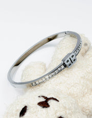 Waterproof silver geometric channel set square crystal bracelet for women Dubai.