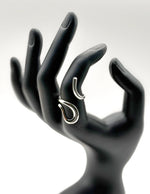 Waterproof silver liquid metal abstract spiral ring for women Dubai.