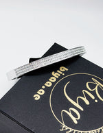 silver plated triple row pave crystal hinge bangle by Biya Accessoires.