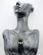 Waterproof gold heart pendant with crystal wings and crown Dubai.
