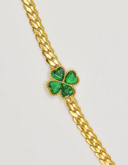 golden_leaf_heart_charm_bracelet_styled_for_evening_wear

