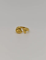 Close-up of heart-inspired 14k gold wedding ring front view