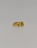 Minimalist wedding ring with open-ended heart details in gold