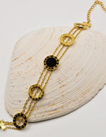luxury_noir_orbit_golden_layered_bracelet_with_black_enamel_canada_jewelry