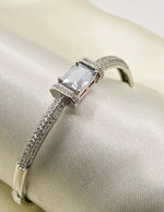 Elegant crystal loom bracelet with ruby-inspired gemstone and shimmering pavé accents, perfect gift for her in Canada.”