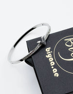 Hypoallergenic non-tarnish high polish silver rigid architectural bangle UAE.