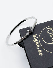 Hypoallergenic non-tarnish high polish silver rigid architectural bangle UAE.