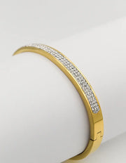 Silver-stone bangle bracelet reflecting soft light