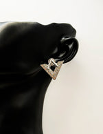 Close up of elegant imitation jewelry uae featuring a geometric crystal ear jacket.
