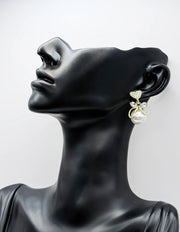 Everyday luxury jewelry uae coquette earrings by the best jewelry shop in UAE.