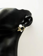 Everyday luxury jewelry uae botanical earrings by the best jewelry shop in UAE.